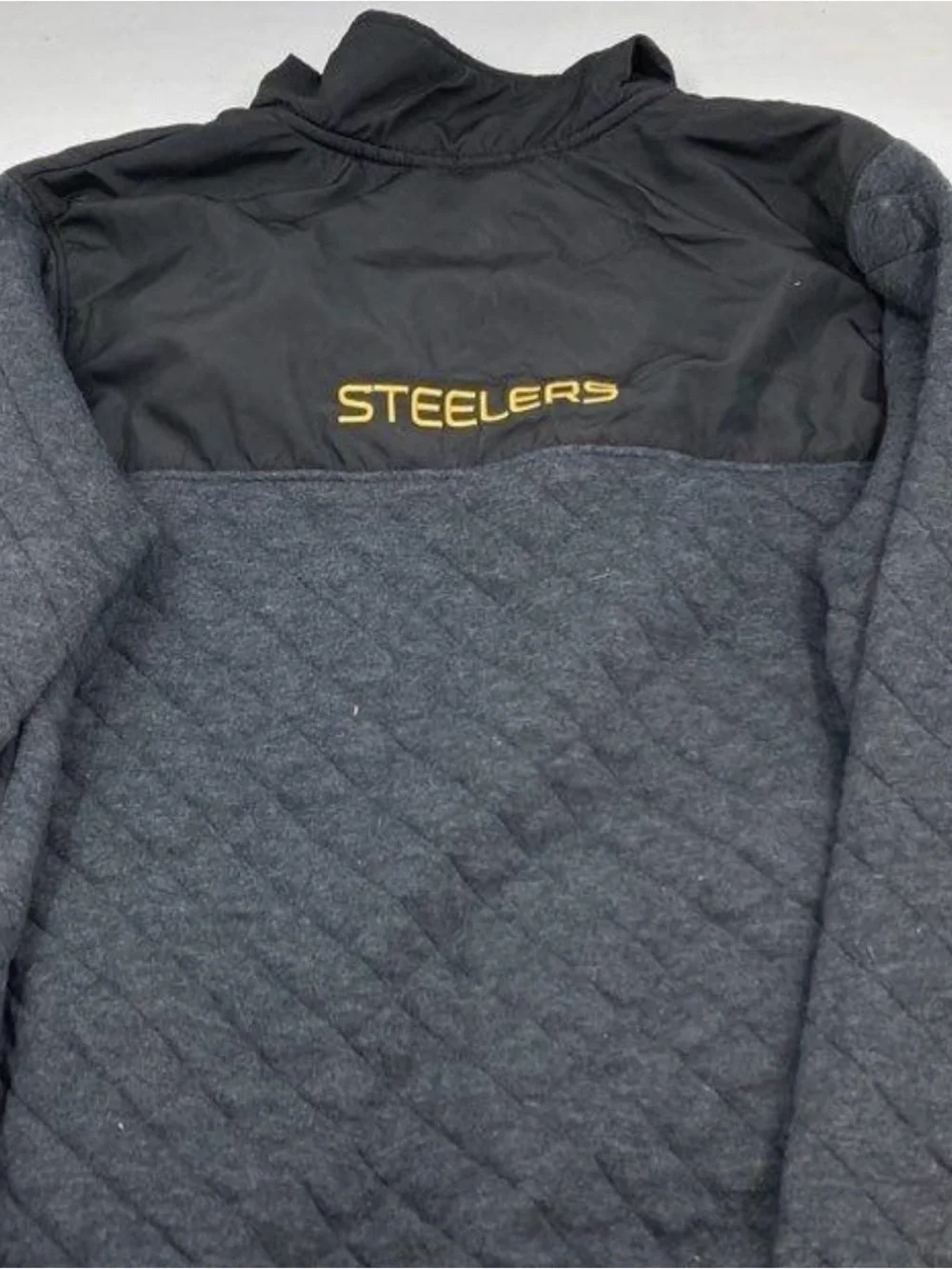 NFL Black and Gray Quilted Pullover with Yellow Zip